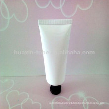 white tube with anise cover cap